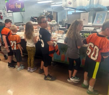 Students lined up in the cafeteria